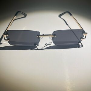 Cartier Gold and Black Sunglasses